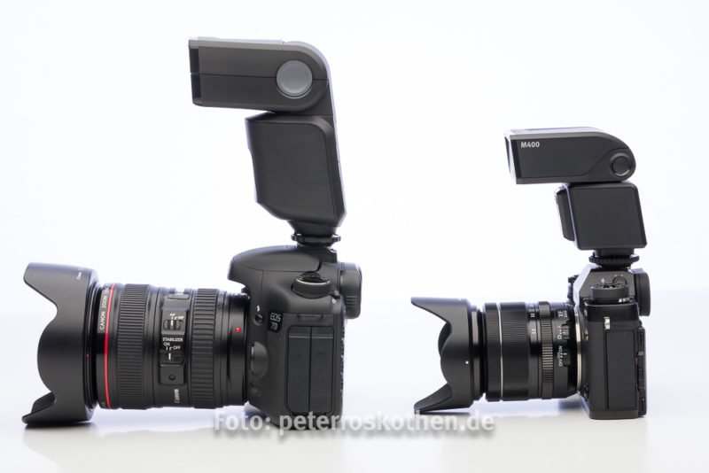 Vergleich Spiegelreflex versus spiegellose Systemkamera: Links Canon EOS 7D, rechts Fujifilm X-T2